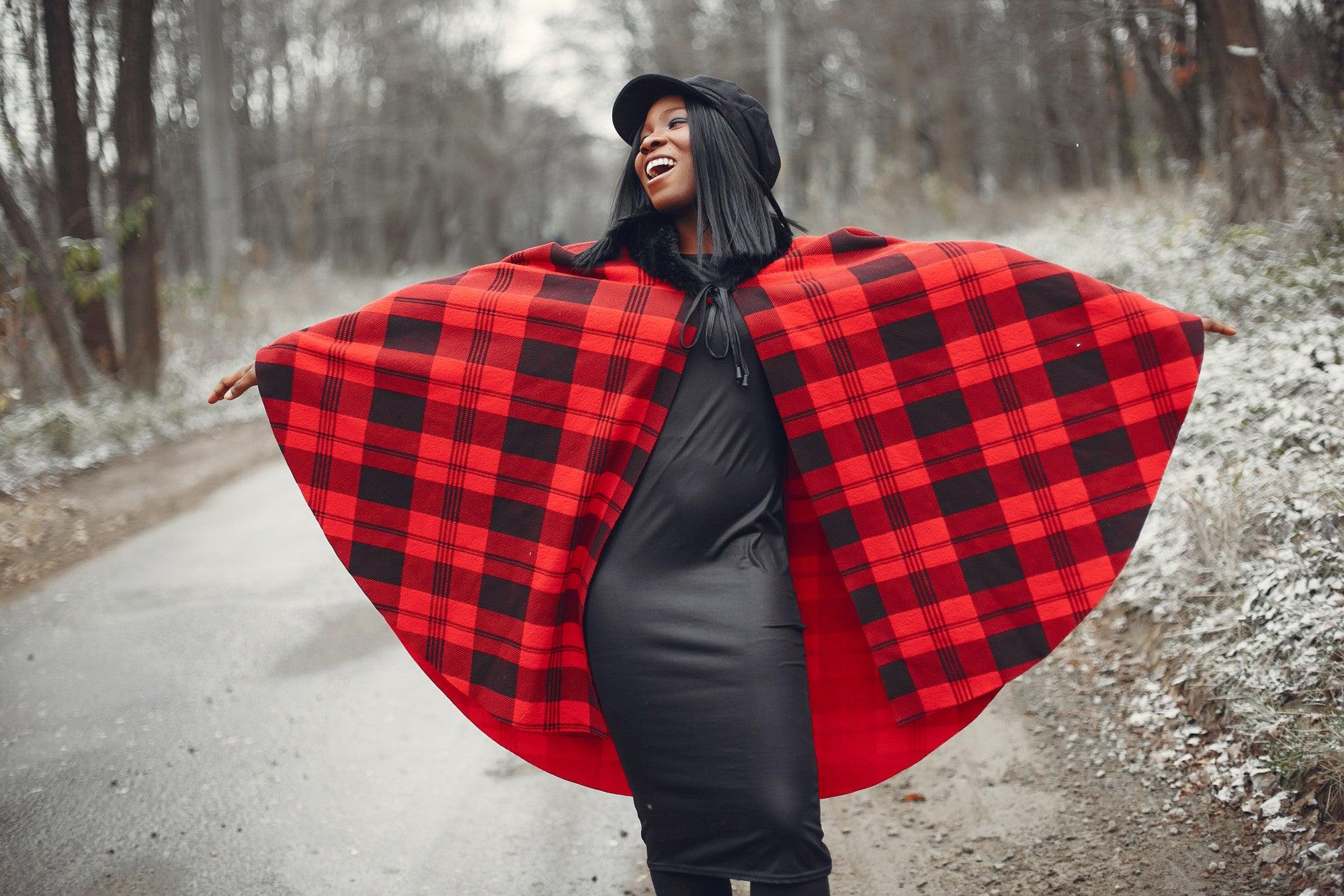 woman wearing a winter poncho